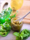 Jalapeno chili pepper pickled pepper slices preserved in glass jar. Opened of chunky spicy salsa sauce Royalty Free Stock Photo