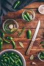 Jalapeno Peppers for Canning with Spices and Glass Jars on Wooden Table Royalty Free Stock Photo