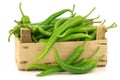 Jalapeno peppers in a wooden crate