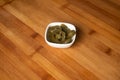 Jalapeno pickled preserved served in plate isolated on wooden table top view of indian food