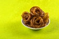 Jalebi Indian sweet dish on green background Royalty Free Stock Photo