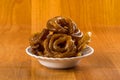 Jalebi Indian sweet dish on a wooden background Royalty Free Stock Photo