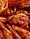 Jalebi is a popular Indian sweet snack in pretzel or circular shapes