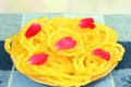 jalebi traditional gujrati indian snack food dish in de focused circle background