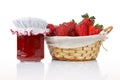 Jam and basket of strawberries Royalty Free Stock Photo