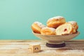 Jam doughnuts with icing sugar for Hanukkah holiday celebration