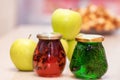 Jam of fir twigs and cones and mountain cranberries in small jars