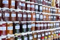 Jam and honey jars made of various fruit types in specialty market, Serbia