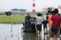 Jam Hsiao filmming with a piano in Gaomei Wetlands Royalty Free Stock Photo