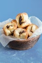 Jam and Nutella Filled Rolls Just out of the Oven Blue Background