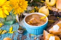 Jam from pears in a bowl on a wooden table Royalty Free Stock Photo