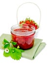 Jam strawberry with basket of berry on napkin Royalty Free Stock Photo