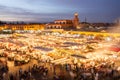 Jamaa el Fna market square in sunset, Marrakesh, Morocco, north Africa. Royalty Free Stock Photo