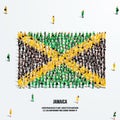 Jamaica Flag. A large group of people form to create the shape of the Jamaican flag.