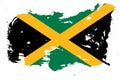 Jamaica flag with painted grunge brush stroke effect on white background Royalty Free Stock Photo