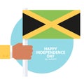 Jamaica Happy Independence Day, 6 august celebration card with hand holding jamaican flag.