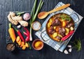 Jamaican Curried Goat in a pot, top view Royalty Free Stock Photo