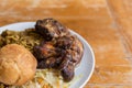 Jamaican curry goat, jerk chicken and fried dumpling