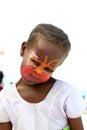 Face painting to local kids in Zanzibar