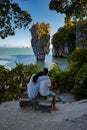 James Bond island near Phuket in Thailand. Famous landmark and famous travel destination, couple men and woman mid age Royalty Free Stock Photo