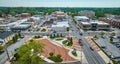 James Cultural Plaza with distant courthouse in downtown Auburn aerial