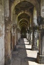 Jami Masjid, Archway corridor with intricate carvings in stone, an Islamic monuments was built by Sultan Mahmud Begada in 1509, Royalty Free Stock Photo