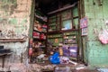 A shop in a grungy wall