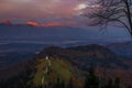 Jamnik, Slovenia - Aerial view of beautiful golden sunset at Jamnik St. Primoz church