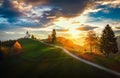 Jamnik, Slovenia - Aerial view over the church of St. Primoz in Slovenia near Jamnik with beautiful clouds and Julian Alps at Royalty Free Stock Photo