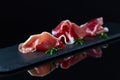 Jamon on a black background Royalty Free Stock Photo