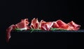Jamon on a black background Royalty Free Stock Photo