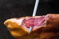 Jamon. Jamon serrano. Traditional Spanish ham on black close up. Royalty Free Stock Photo