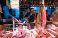 Jamon Seller in La Boqueria Market in Barcelona, Spain