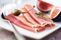 Jamon Serrano with caper berries and figs