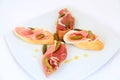 Jamon. Serrano ham, prosciutto served on bread. Tapas Royalty Free Stock Photo