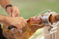 Jamon. Traditional Spanish ham on black close up. Slicing Hamon iberico Royalty Free Stock Photo