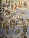 Close-up photo of The Last Judgment ceiling fresco painting by Michelangelo in the Sistine Chapel