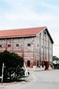 Old wooden awamori distrillery building, Naha, Okinawa, JAPAN Royalty Free Stock Photo