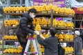 People shop for flowers at the Victoria Park Flower Market in preparation for the Chinese New Year, the Year of the Rabbit