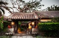 Japanese Okinawa style house with tiles roof in garden