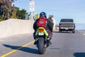 Jan 3, 2020 San Jose / CA / USA - Motorcyclist riding on the carpool lane in South San Francisco Bay Area; Motorcycles are