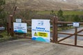 The security gates at the entrance to the Fofanny Water treatment Works near Slieve Bernagh in the Western Mournes in county Down Royalty Free Stock Photo