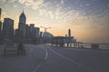 Sunset Silhouette Cityscape with Waterfront Promenade Jan 12 2024