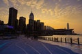 Sunset Silhouette Cityscape with Waterfront Promenade Jan 12 2024