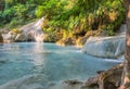 Jangle landscape with flowing turquoise water of Erawan Royalty Free Stock Photo