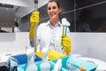 Janitor or charlady with her work tools looking at camera Royalty Free Stock Photo