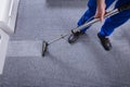 Janitor Cleaning Carpet