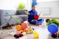 Janitor cleaning a mess Royalty Free Stock Photo