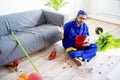 Janitor cleaning a mess Royalty Free Stock Photo