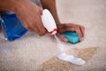 Janitor Cleaning Spilled Coffee On Carpet